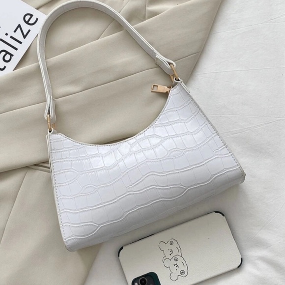 white alligator purse